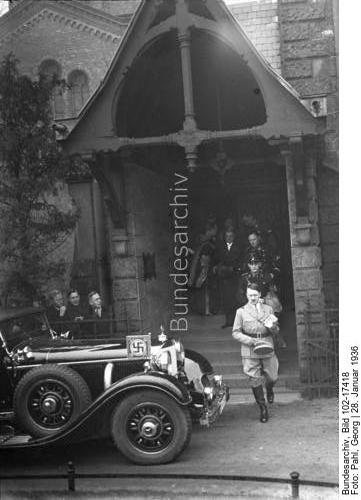Adolf Hitler leaves Berlin's English St. George church after the funeral service for King George V of England